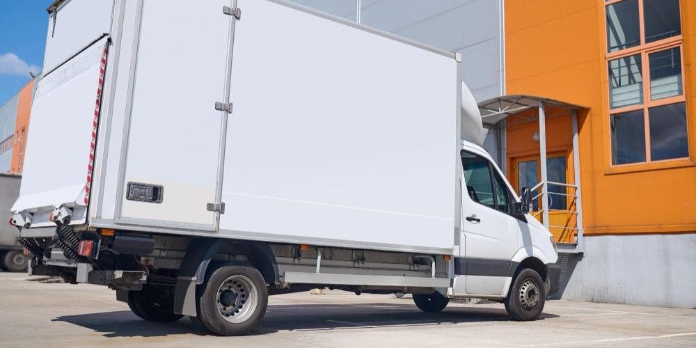 Lorry standing outdoors near the warehouse